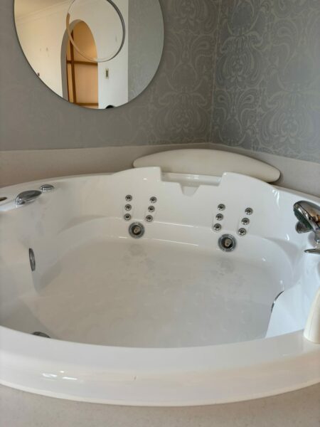 White whirlpool bath