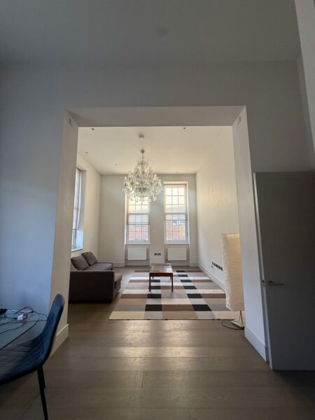 View through a doorway into a bright living room